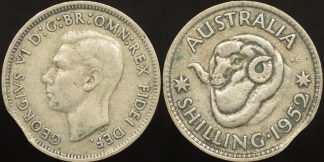 Clipped planchet error Australian 1952 shilling